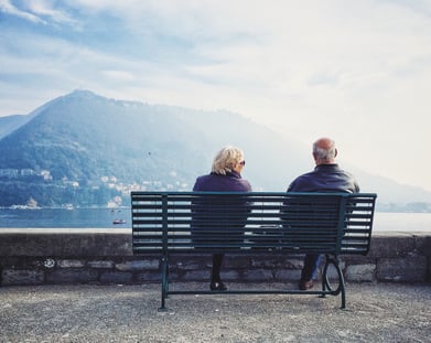 Couple talking on a bench